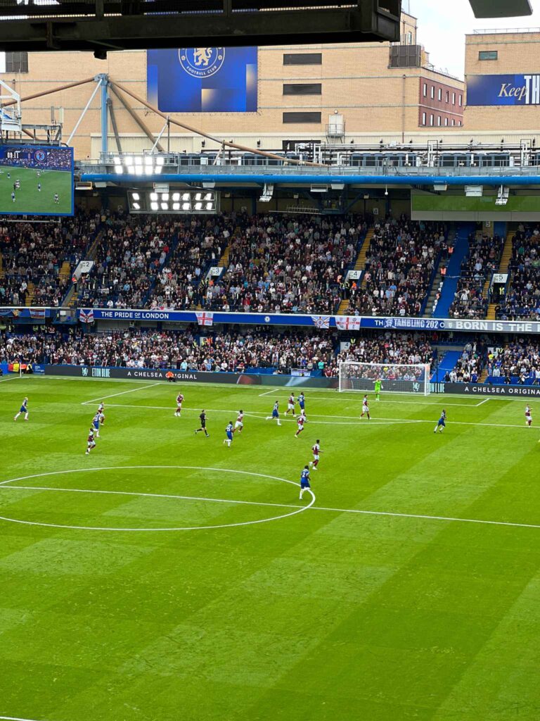 Chelsea players running on field